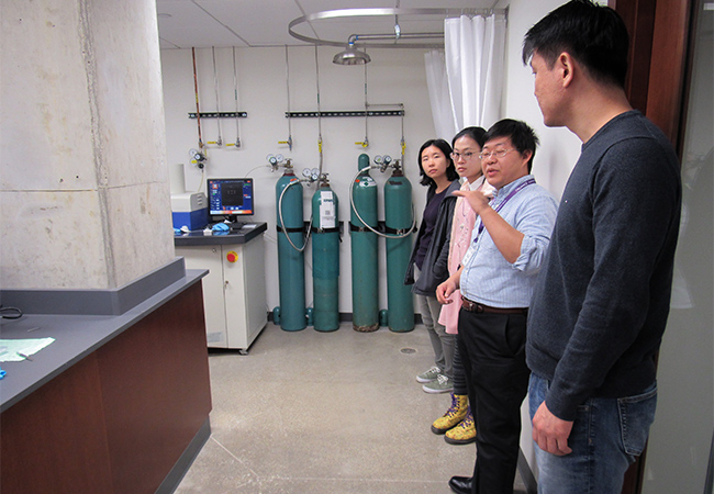 Dr. Kai He shows students the new J-Wing in the Technology Institute