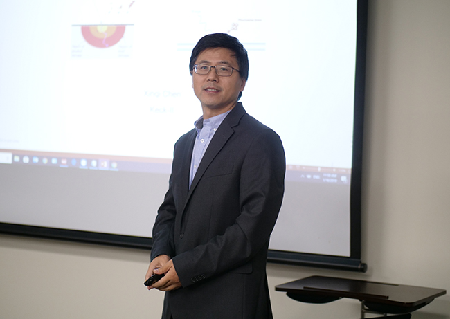 Dr. Chen presenting his talk