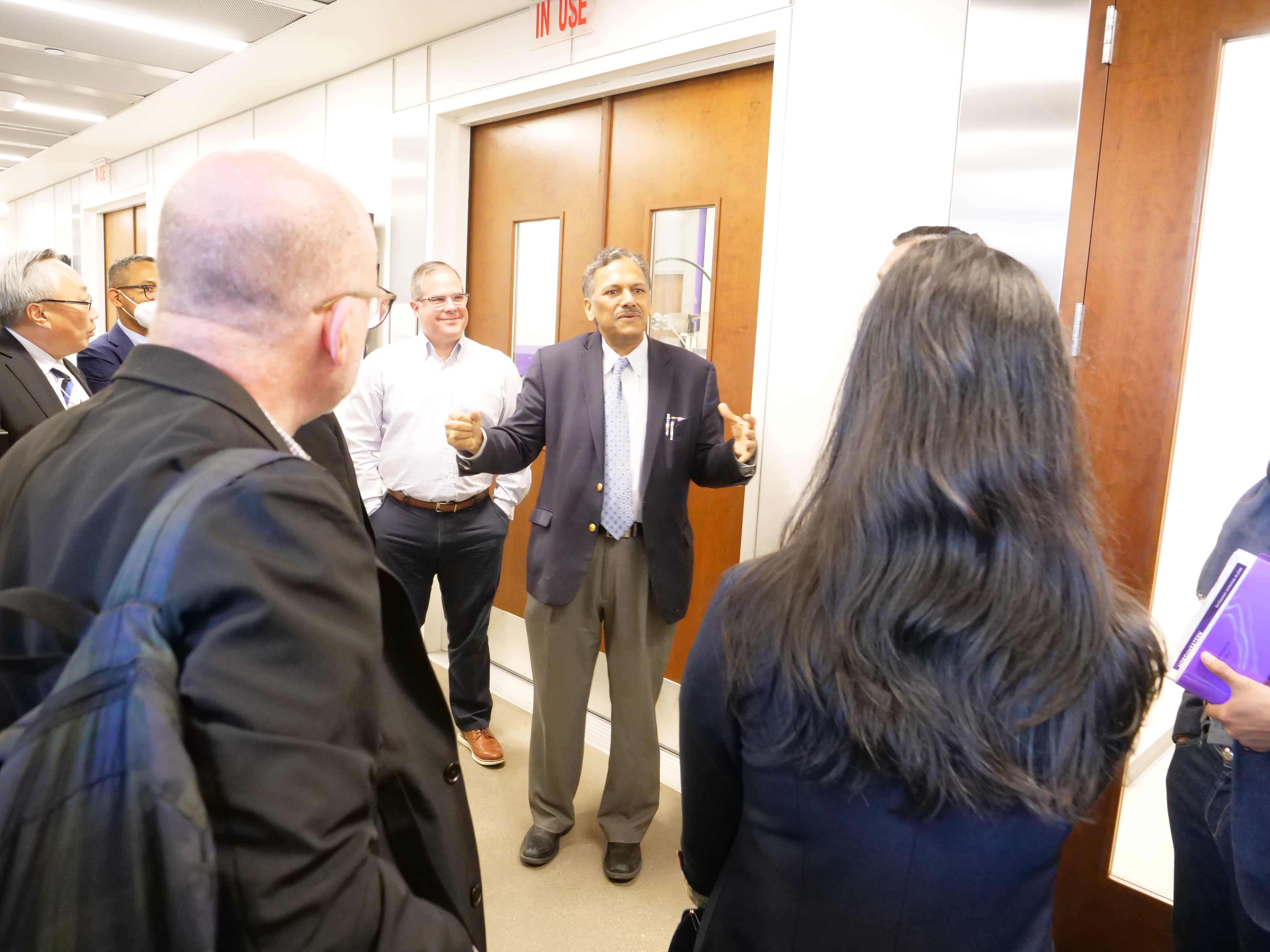 Professor Dravid with the group touring NUANCE Facilities