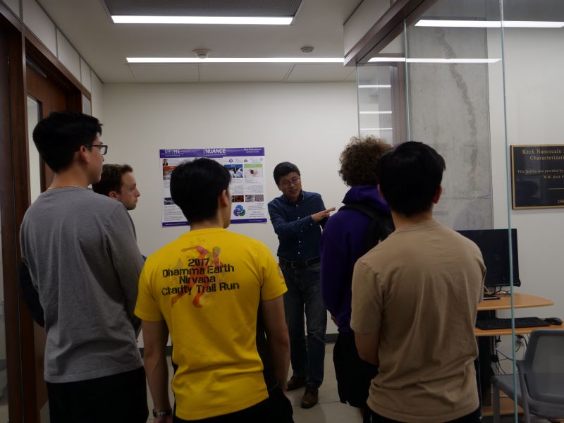 Dr. Xinqi Chen shows Nanonu students around